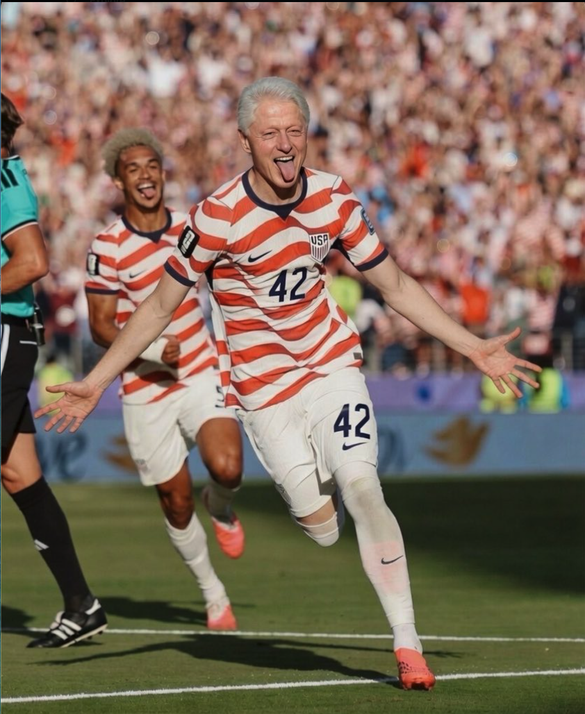 A person resembling Bill Clinton in a USA #42 jersey celebrating on a soccer pitch.