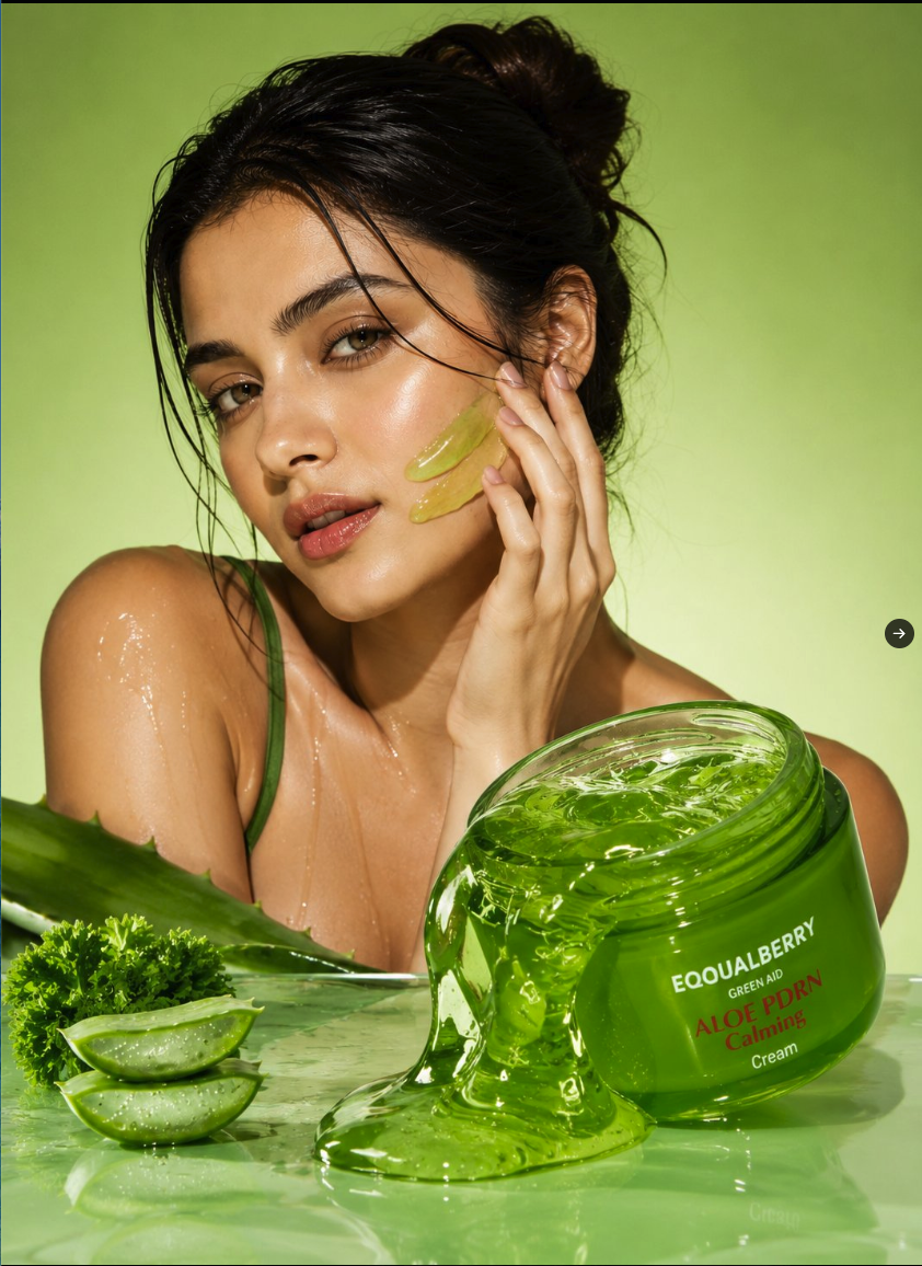 An unidentified woman with aloe vera gel on her cheek beside an EQQUALBERRY Aloe Calming Cream jar.