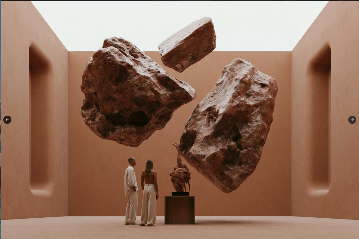 Two people standing in a terracotta-toned gallery viewing large floating rock sculptures suspended in mid-air.
