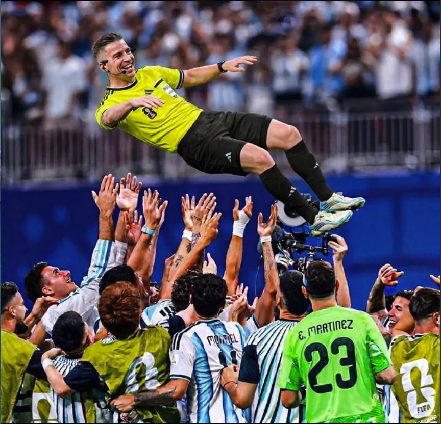 Players resembling Dawid Konarski, Nilmar, and Houari Ferhani celebrating on a soccer pitch, with one man in yellow tossed into the air.