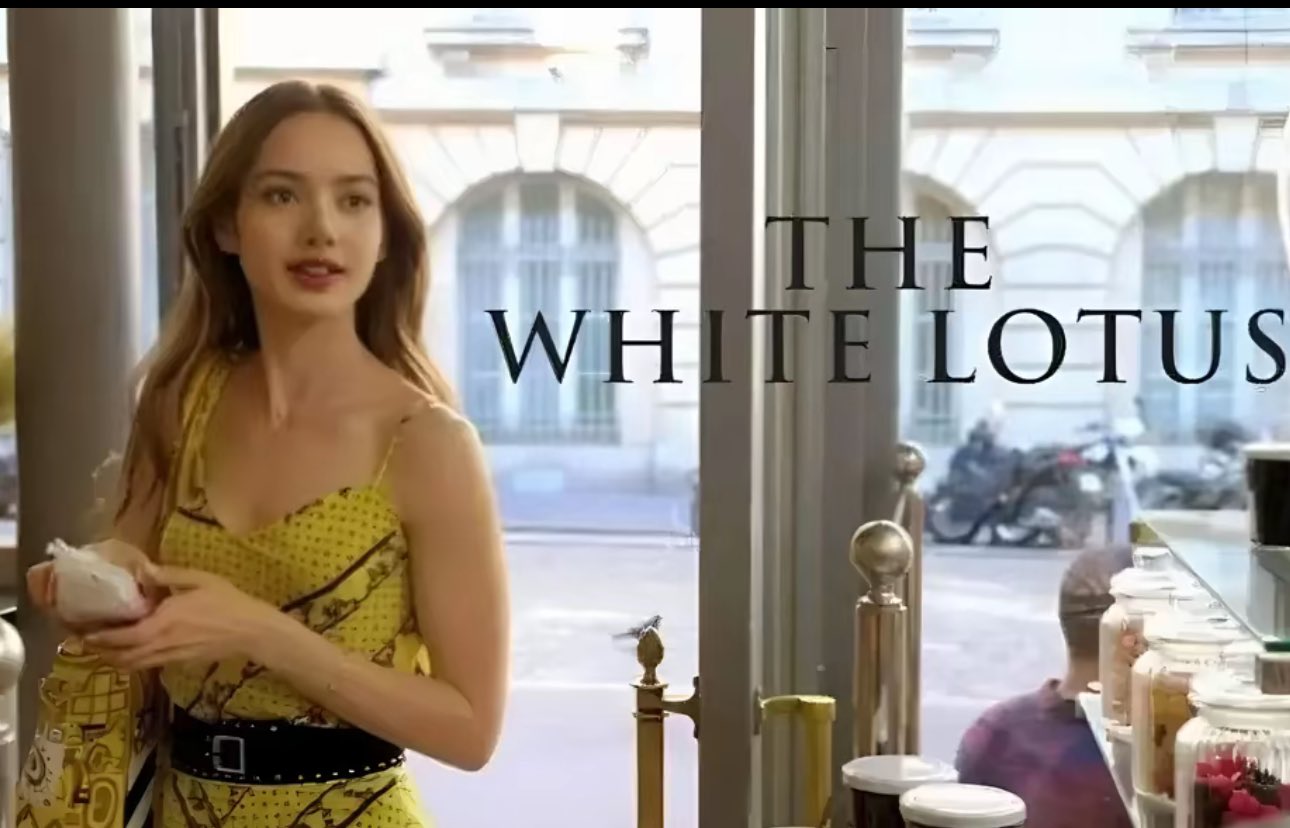 A woman resembling Lily Collins in a yellow sundress at a café, with 'The WHITE LOTUS' title text overlaid.