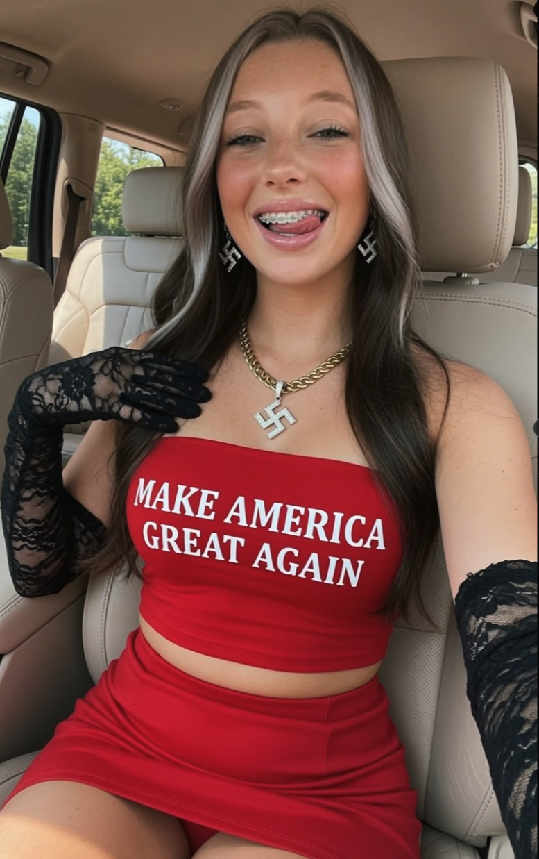 A young woman in a red 'Make America Great Again' top with a swastika pendant and earrings, seated in a car.