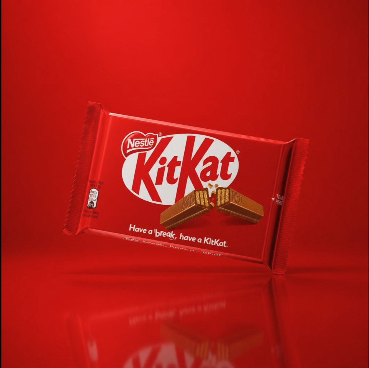 A red Nestlé KitKat chocolate bar wrapper against a red background with the KitKat logo and 'Have a break, have a KitKat' tagline.