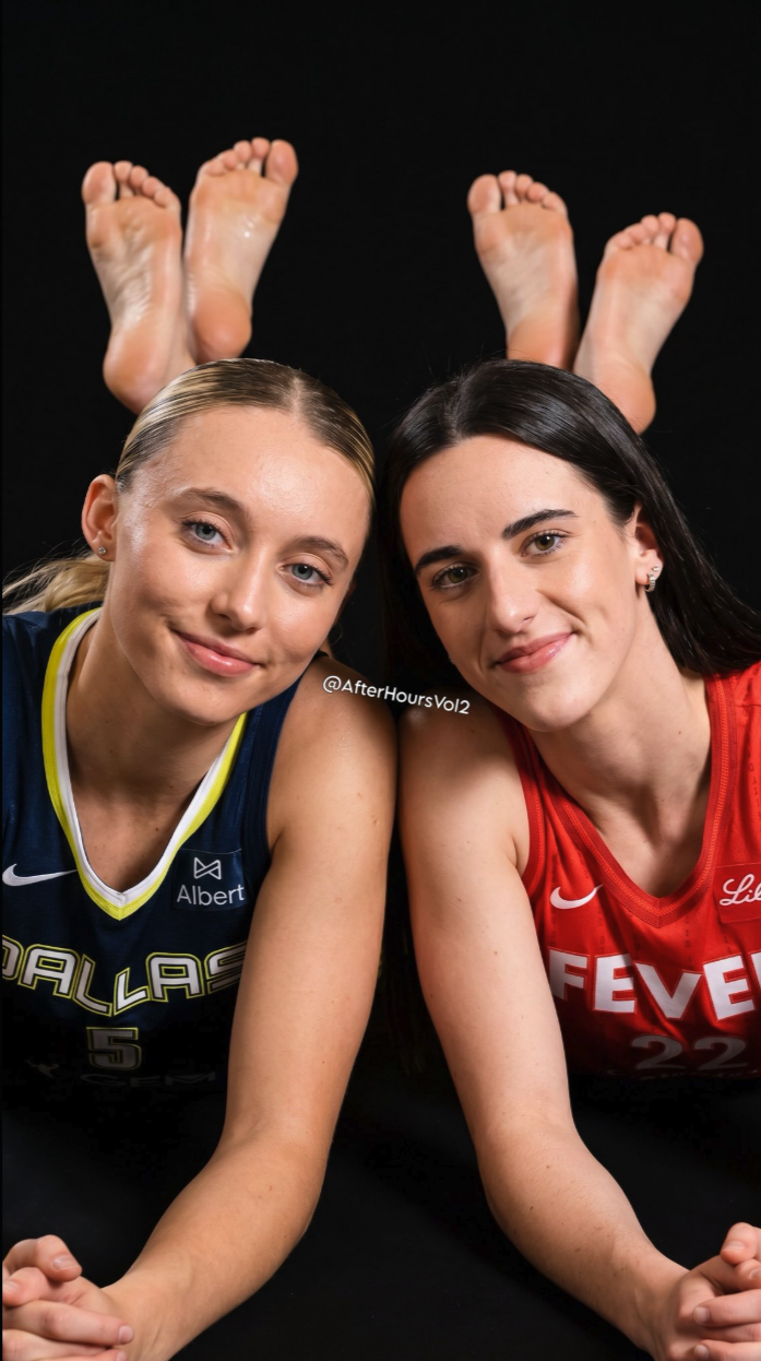 Two women resembling Paige Bueckers and Caitlin Clark lying down in WNBA jerseys, with their bare feet raised at the top of the frame.