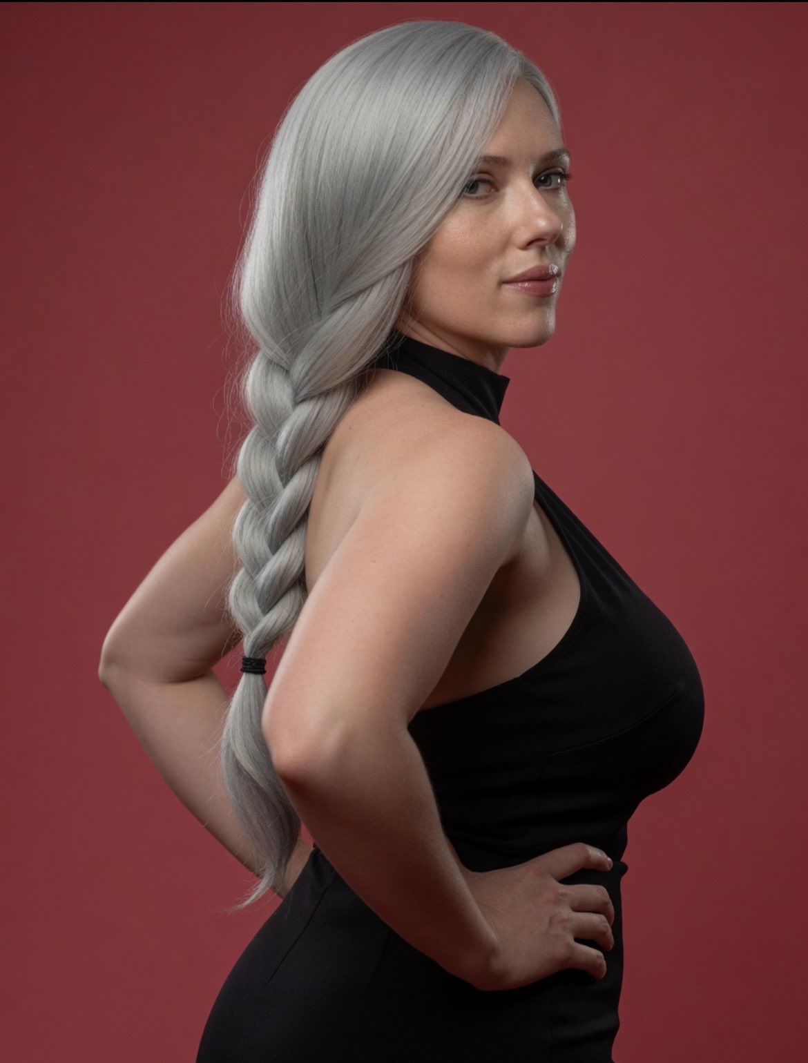A woman resembling Scarlett Johansson with a long silver braid, wearing a black sleeveless top against a red background.