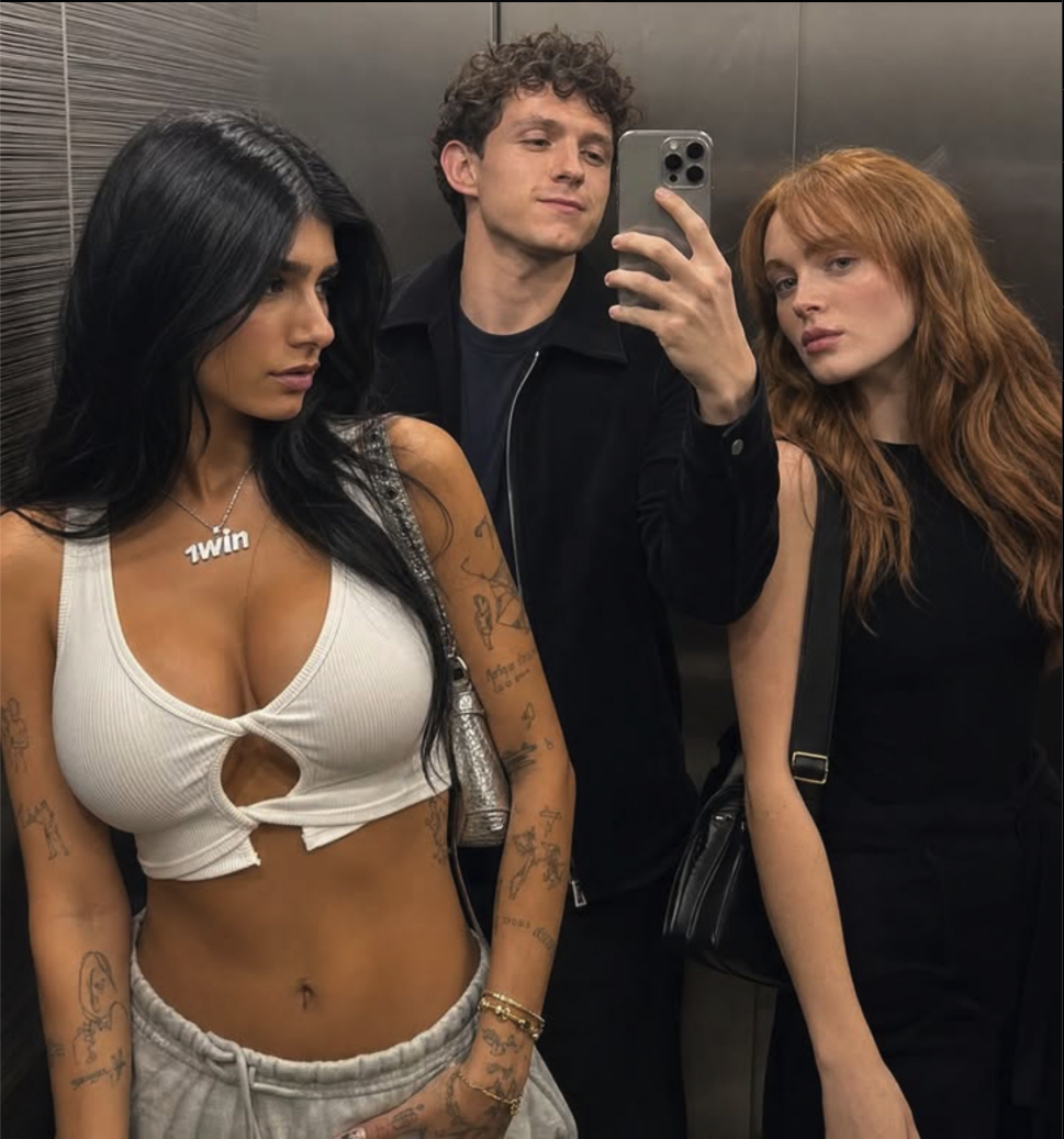 A man resembling Tom Holland and a woman resembling Sadie Sink taking an elevator selfie together.