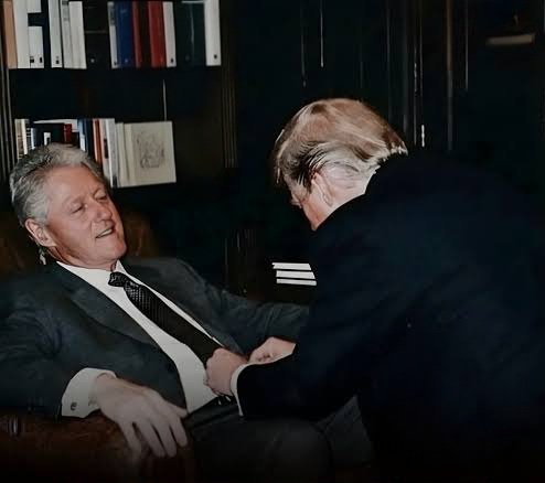 Two men resembling Donald Trump and Bill Clinton in an office, with bookshelves in the background.