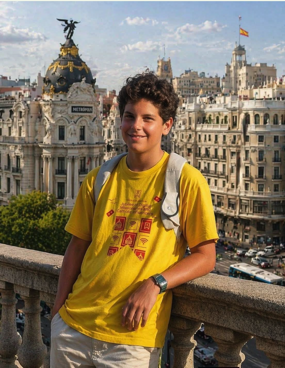 A young person wearing a yellow t-shirt standing on a balcony overlooking a Madrid cityscape.