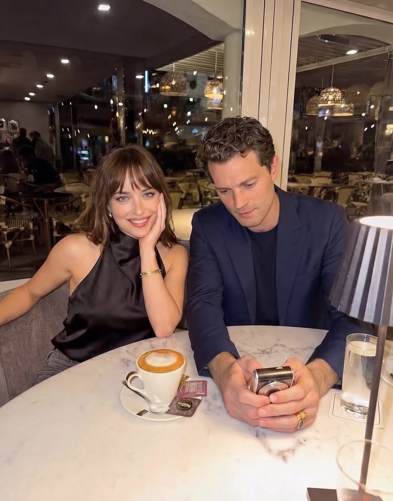 AI image Dakota Johnson Jamie Dorman dinner