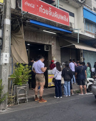 AI-generated image of a Thai street food stall