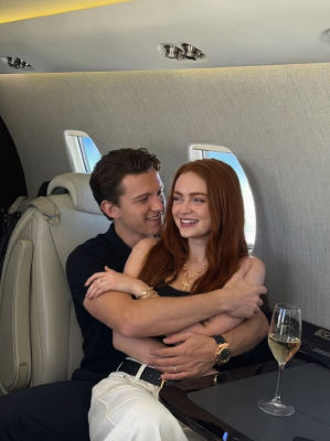 AI-generated image of Tom Holland and Sadie Sink embracing on a private jet