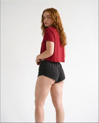 AI-generated image Sadie Sink in athletic wear against a white background