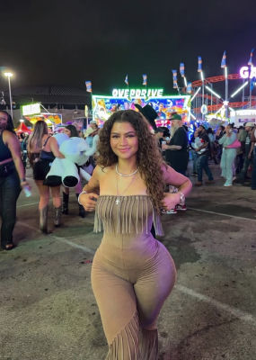 AI-generated image of Zendaya posing at an outdoor festival