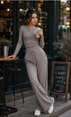 AI-generated image of a woman in loungewear outside a café