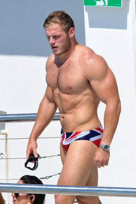 AI-generated image of Tom Burgess in Union Jack swim briefs on a boat