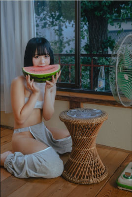 AI-generated image of an unidentified woman holding a watermelon slice