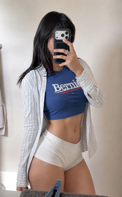 AI-generated mirror selfie in a Bernie campaign shirt