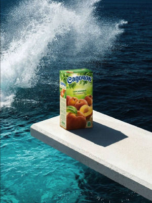 AI-generated image of Садочок peach juice carton on a diving board