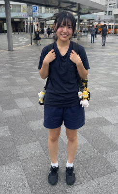 AI-generated image of an unidentified woman at a Japanese transit station