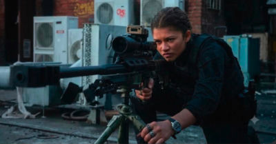 AI-generated image of Zendaya aiming a sniper rifle in an urban setting
