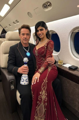 AI-generated image resembling Robert Downey Jr. and Mia Khalifa in a private jet