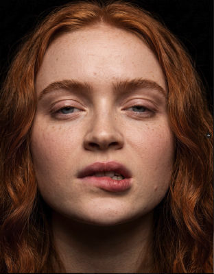 AI-generated portrait of Sadie Sink with freckles