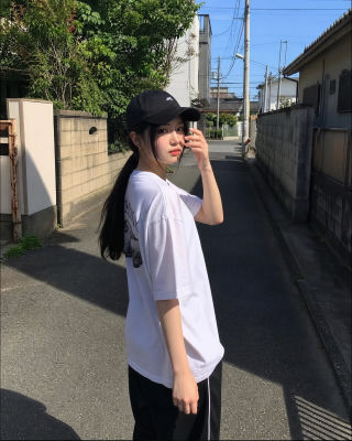 AI-generated image of an unidentified young woman on a Japanese street