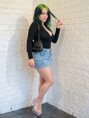 AI-generated image resembling Billie Eilish in a black bodysuit and denim skirt