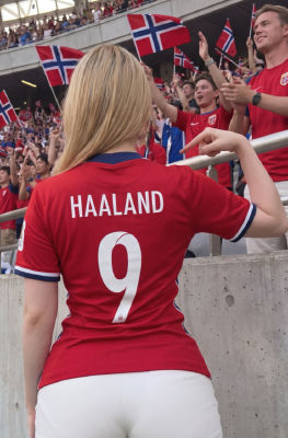 AI-generated image of a fan in a Haaland Norway jersey amid stadium crowd