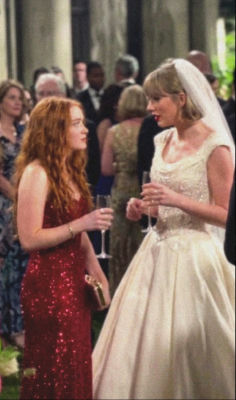 Deepfake of Taylor Swift and Sadie Sink at a wedding reception