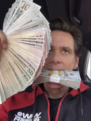 AI-generated image of Jim Carrey holding stacks of cash