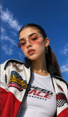 AI-generated selfie of a woman in racing-themed attire