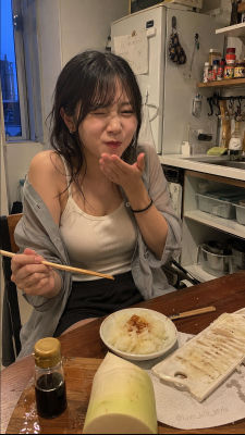 AI-generated image of a woman at a kitchen dinner