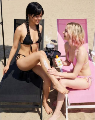 AI-generated image of Jenna Ortega and another woman in bikinis at the beach