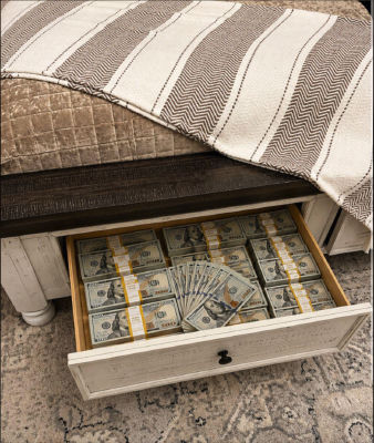 AI-generated image of stacks of $100 bills hidden in a bed drawer