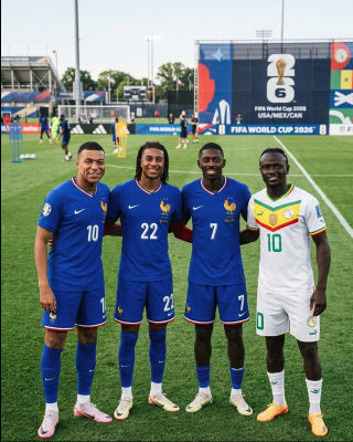 AI-generated image of Kylian Mbappé, Michael Olise, Ousmane Dembélé, and Sadio Mané at a 2026 World Cup training pitch
