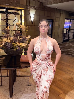 AI-generated image of woman in a floral halter dress