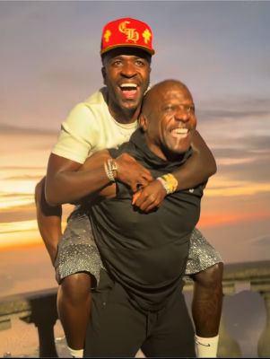 AI-generated image of Vini Jr. being carried on Terry Crews's back at sunset