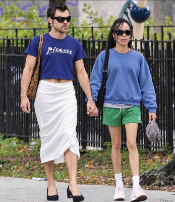 AI-generated image of  Harry Styles walking with a woman resembling Zoë Kravitz