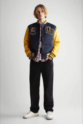 AI-generated image of a man in a navy and yellow varsity jacket