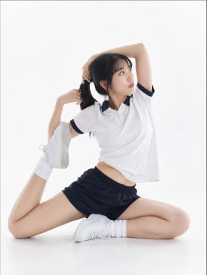 AI-generated image of a young woman in a school PE uniform in a stretch pose