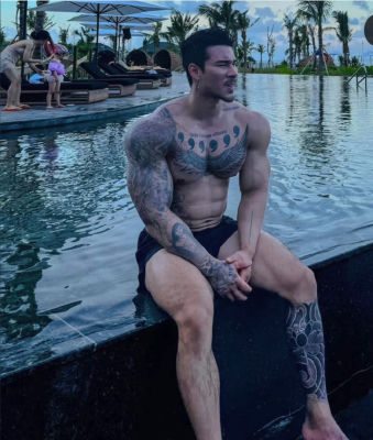 AI-generated image of  an unidentified man seated at a resort pool