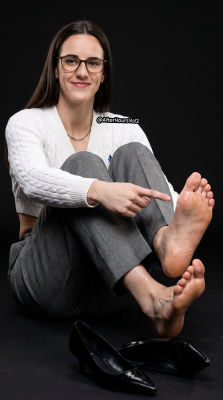 AI-generated image of Caitlin Clark in a suggestive barefoot studio pose