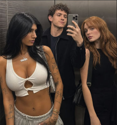 AI-generated selfie of Tom Holland ,Sadie Sink and Mia Khalifa wearing '1win' necklaces 