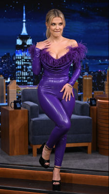 AI-generated image of Millie Bobby Brown on The Tonight Show in a purple jumpsuit