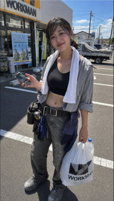 AI-generated image of an unidentified woman outside a WORKMAN store in Japan