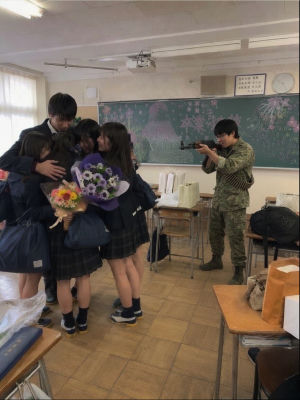 AI-generated image of an armed figure in a Japanese classroom