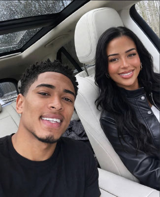 AI-generated selfie appearing to show Tulisa Contostavlos and Jude Bellingham in a car