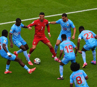 AI-generated image of Cristiano Ronaldo, Liridon Krasniqi, and Jhon Kennedy Hurtado in a soccer match