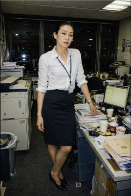 AI-generated image appearing to show woman in an office